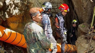 Seven people have been trapped in a Laos cave for a week