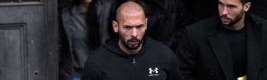 What is Andrew Tate charged with? Online personality charged in Romania
