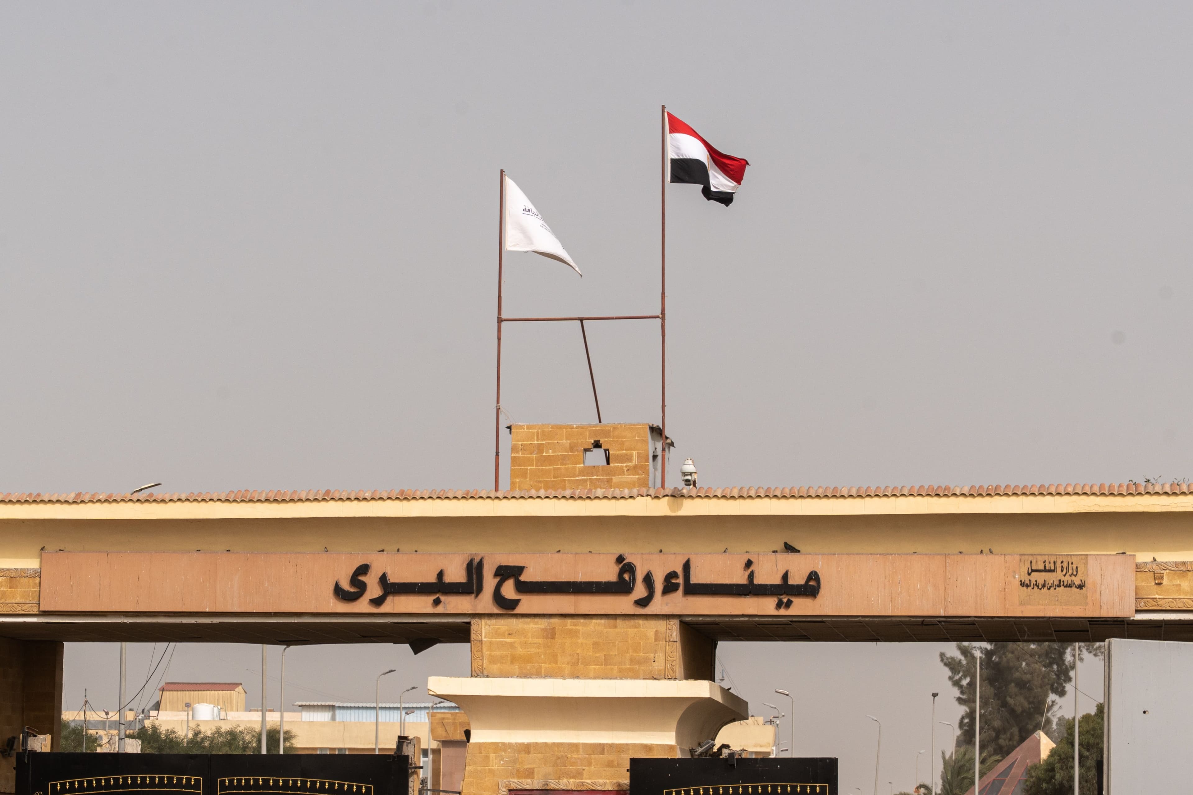 Israel re-opens Rafah crossing under ceasefire plan, day after Israeli strikes kill 30