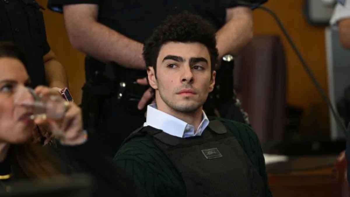 A man has posed as an FBI agent to free Luigi Mangione
